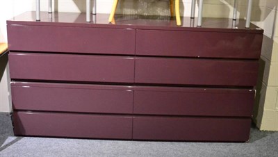 Lot 1145 - Modern aubergine eight drawer unit and matching low coffee table