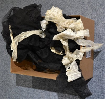 Lot 1149 - Assorted mainly black lace, including skirt mount, flounces, shawls and some cream lace...