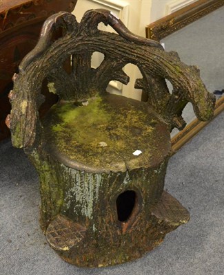 Lot 1151 - A naturalistic garden seat in the form of a tree stump (a.f.)