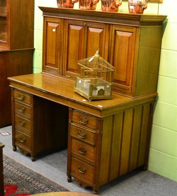 Lot 1217 - Spowith & Co panelled oak kneehole desk