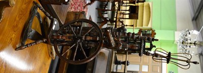 Lot 1264 - Late George III spinning wheel and two loom shuttles