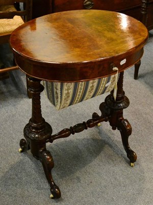 Lot 1268 - Victorian walnut sewing table