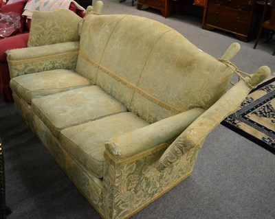 Lot 1295 - Three seater drop-arm sofa with shaped back