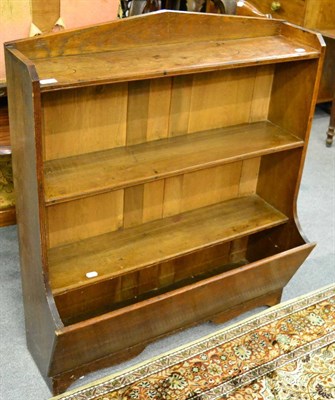 Lot 1297 - An early 20th century oak bookshelf/magazine rack