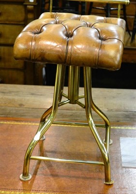 Lot 1301 - Brass and leather harpist's chair