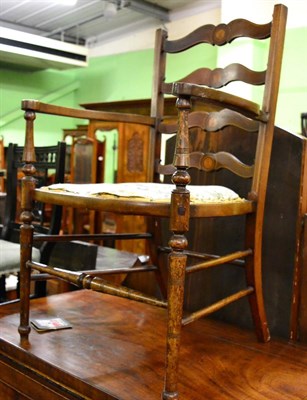 Lot 1312 - An Edwardian inlaid mahogany armchair