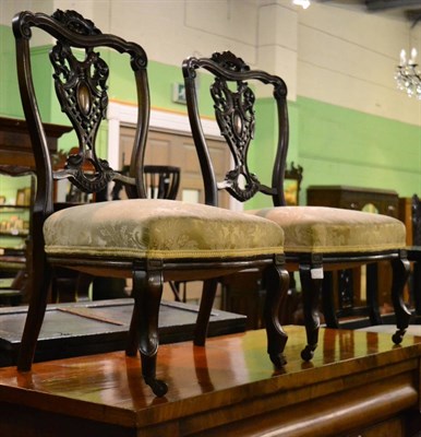 Lot 1317 - Pair of 19th century carved mahogany chairs