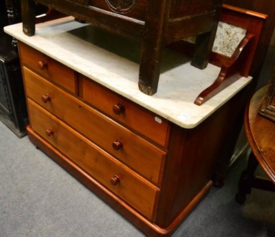 Lot 1320 - Two piece bedroom suite comprising a marble topped mahogany washstand and a carved mahogany...