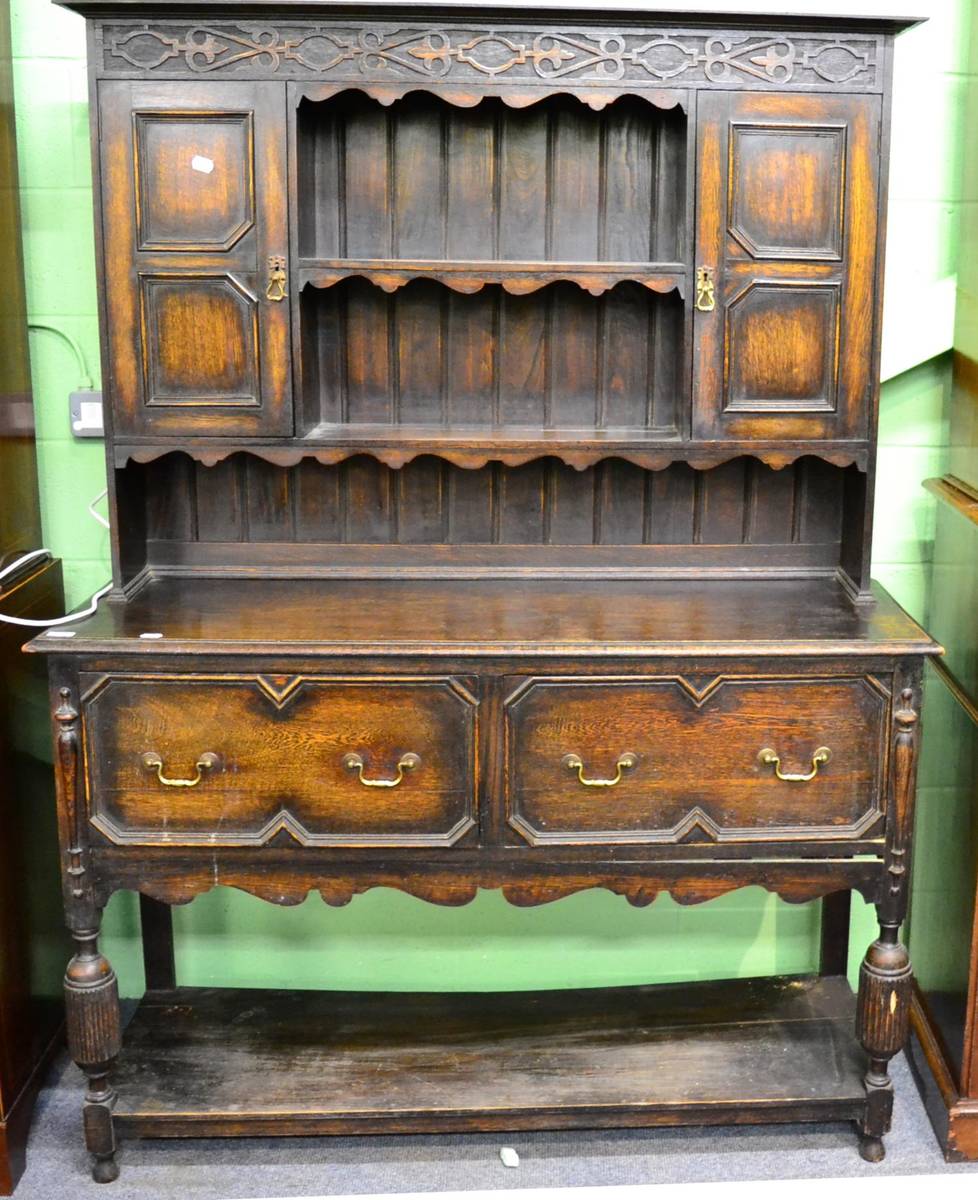 Lot 1344 - Carved oak Welsh dresser