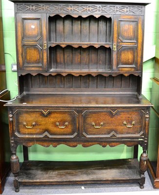 Lot 1344 - Carved oak Welsh dresser