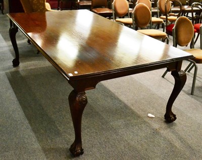 Lot 1350 - A mahogany table on claw and ball feet