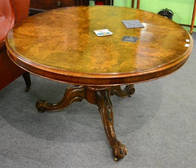 Lot 1354 - Victorian burr walnut circular loo table raised on three carved down scroll legs