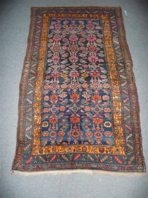 Lot 1371 - Kurdis rug, Persian Kurdistan, the indigo Herati field enclosed by leaf and calyx borders, 237cm by