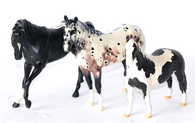 Lot 9 - Beswick Horses comprising: 'Pinto Pony', model No. 1373, Piebald matt, 'Appaloosa Stallion',...