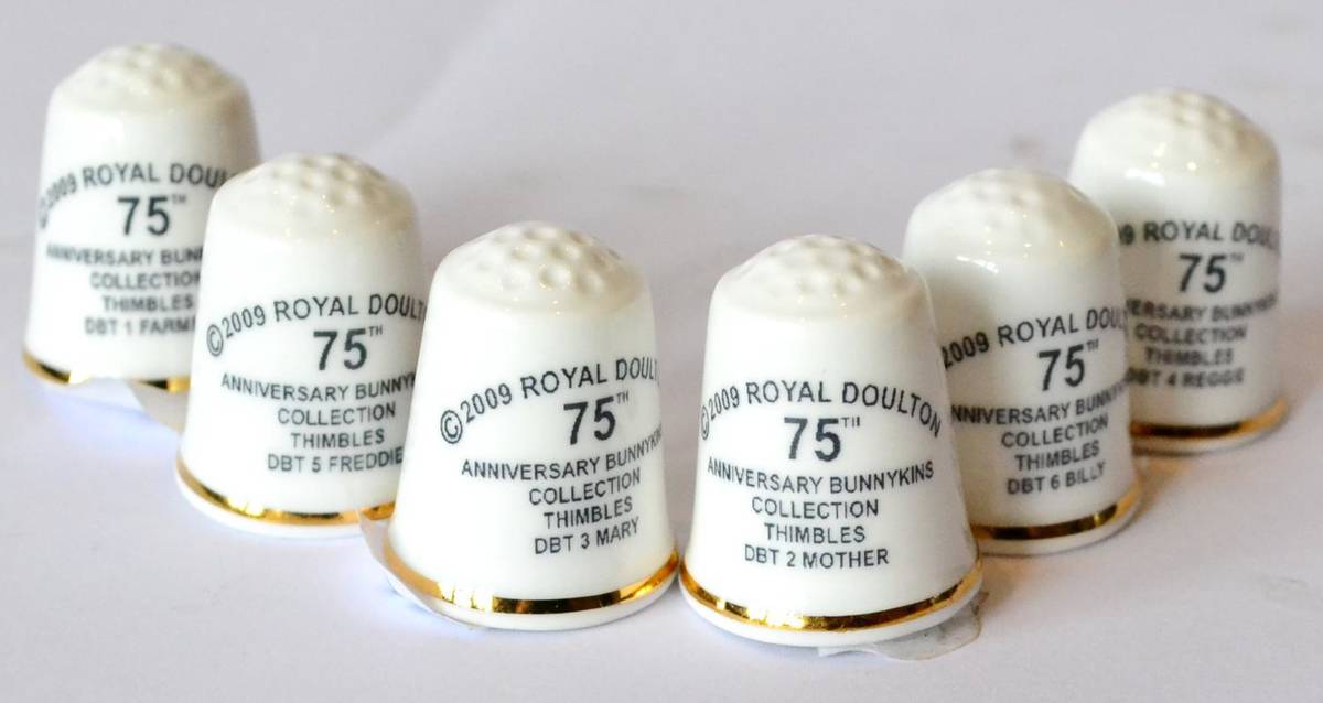 Lot 108 - Royal Doulton Anniversary Bunnykins Thimbles, a rare set comprising: 'Billy', 'Reggie',...