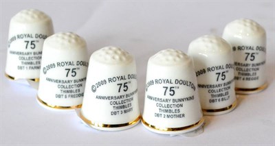 Lot 108 - Royal Doulton Anniversary Bunnykins Thimbles, a rare set comprising: 'Billy', 'Reggie',...