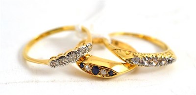 Lot 115 - An 18ct gold diamond and sapphire ring, an early 20th century diamond five stone ring and a...