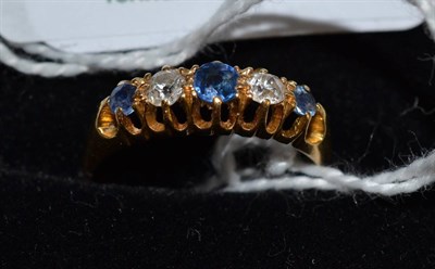 Lot 117 - An 18ct gold sapphire and diamond five stone ring