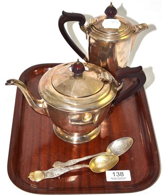 Lot 138 - Silver teapot, water jug and two spoons