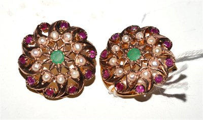 Lot 148 - A pair of Victorian clips set with emerald, rubies and seed pearls