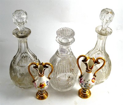 Lot 153 - Pair of Edwardian cut glass decanters and stoppers, another single example and two French porcelain