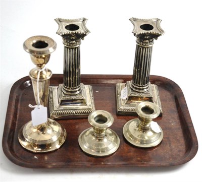 Lot 154 - A pair of silver plated candlesticks, pair of silver dwarf candlesticks and another silver...
