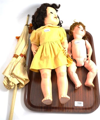 Lot 159 - Heubach Koppelsdorf bisque head doll, another doll and a pottery handled parasol
