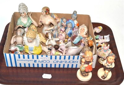 Lot 162 - A tray of ceramics including two Goebel figures and a collection of pin cushion doll torsos