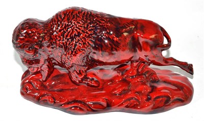 Lot 211 - Peggy Davies ceramic figure: The Bison (in ruby fusion colour)