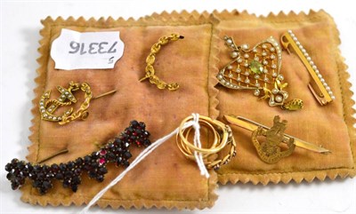 Lot 239 - Four yellow metal rings, seed pearl set brooches, loyal North Lancashire brooch etc