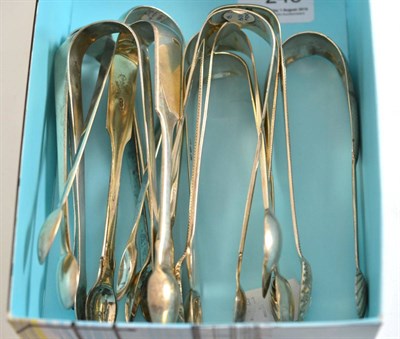 Lot 248 - Six pairs of Old English pattern silver sugar tongs, two pairs of Fiddle pattern sugar tongs...