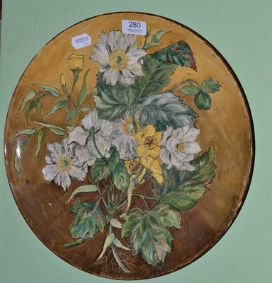 Lot 280 - An Arts and Crafts Minton charger painted with flowers by H B Stewart. dated 1881, with...