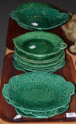 Lot 281 - A pottery green glaze dessert service on two trays