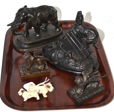 Lot 284 - Spelter elephant, spelter dog group, a pair of bronze winged lions and Austrian cold painted...