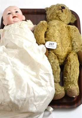 Lot 287 - J D Kestner bisque head character doll with fixed brown eyes and a jointed plush teddy bear (2)