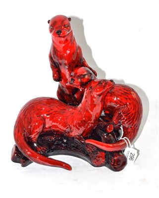 Lot 296 - Peggy Davies Ceramic figure, The Otters (in ruby fusion colour)