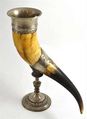 Lot 299 - A 19th century cow horn modelled as a spill vase, with silver plated mounts, the base stamped 'WMF'