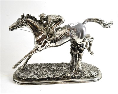 Lot 301 - A silvered model of a horse and jockey