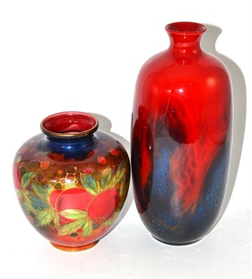 Lot 306 - A Royal Doulton flambe vase and another with gilt decoration initialled HN (Harry Nixon) (2)