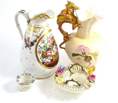 Lot 313 - A dragon handle blush ivory jug, another decorated with flowers and two baskets