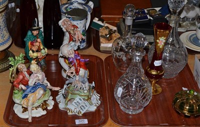 Lot 320 - Two Naples figures, another, a Doulton figure, Bohemian dish, three decanters and vase (two trays)