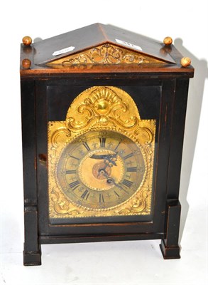 Lot 341 - An oak cased mantel clock with brass dial