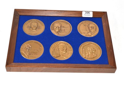 Lot 396 - Framed display enclosing six medallions of Joseph B Strousse, W J Wilgus, John Smeaton etc