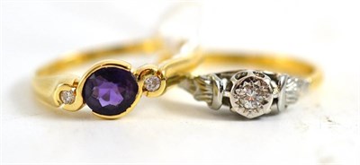 Lot 401 - A 9ct gold amethyst and diamond three stone ring and a diamond solitaire ring (2)