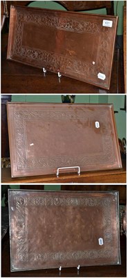 Lot 431 - Three Keswick School of Industrial Arts rectangular copper trays, each with stamped KSIA mark