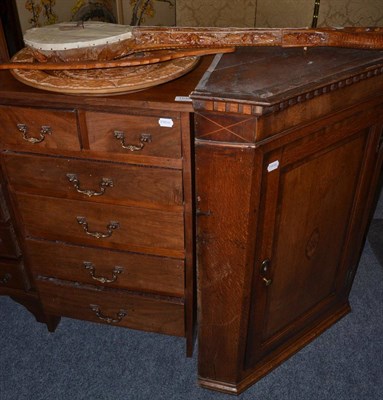 Lot 1039 - Georgian oak and mahogany inlaid corner cabinet, a five height chest of drawers, carved...