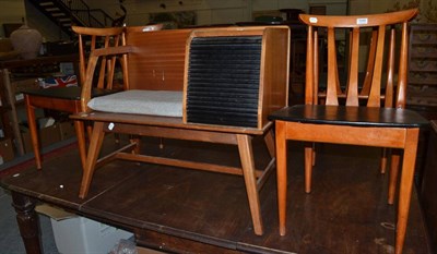 Lot 1044 - A set of four Elliott's of Newbury teak dining chairs, slat backs, black vinyl seats, labelled,...