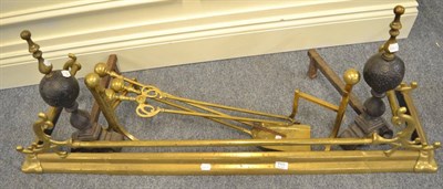 Lot 1111 - Victorian brass extending fire curb, brass fire irons and two pairs of fire dogs