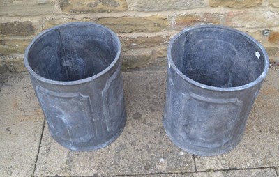 Lot 1118 - Pair of cylindrical lead garden planters with panel decoration, 33cm diameter, 38cm high