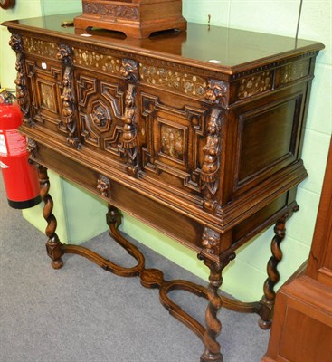 Lot 1202 - An oak and mother-of-pearl inlaid cabinet in 17th century style, three cupboards above two...